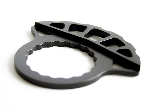 Protection de roue libre pour pédalier deux pièces|Freewheel protection for two-piece pedal